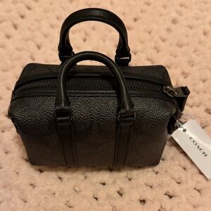 Coach mini Black Textured Leather Duffel Bag